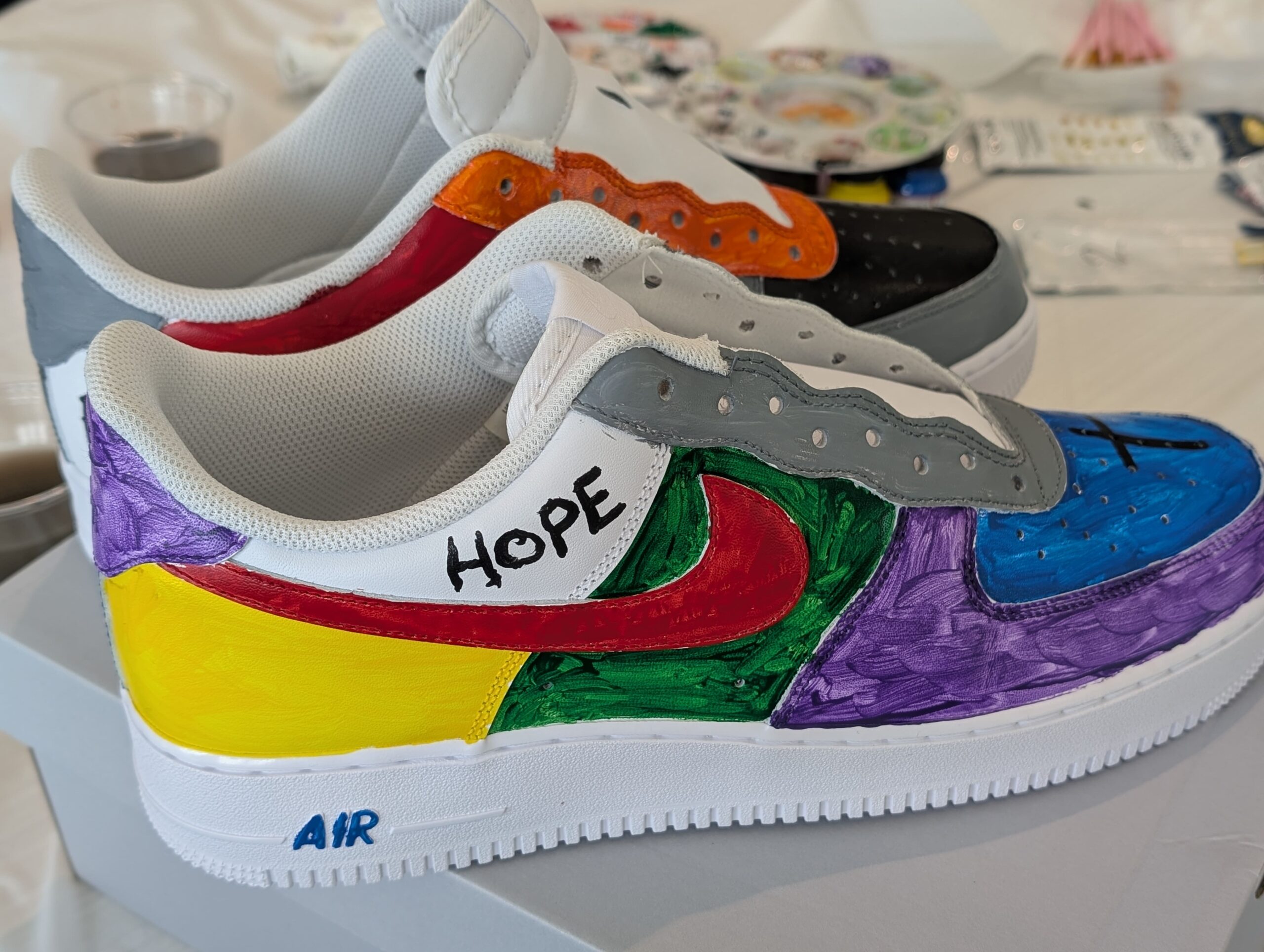 Beautiful Soles: The Steps of my Story: On June 3, residential students at Josiah White’s artistically expressed their worst and best memories by painting Air Force 1 sneakers as part of their art intervention program.